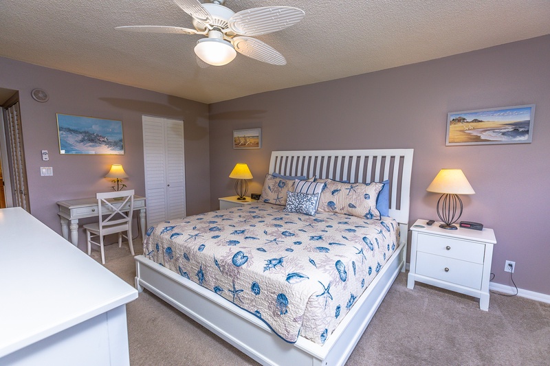 Drift off peacefully in this coastal-themed bedroom where soft ocean blues meet crisp white furnishings, creating your perfect seaside sanctuary.