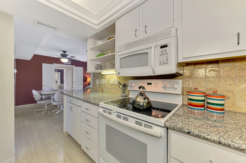 Your fully equipped kitchen features granite countertops, modern appliances, and everything you need to create memorable meals during your stay.