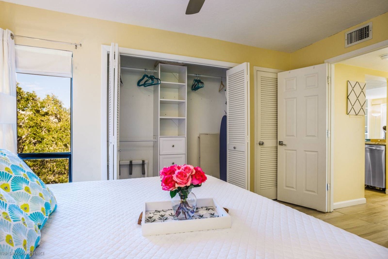 Rest easy in your bright, cheerful bedroom with ample closet space and fresh flowers welcoming you home each day.