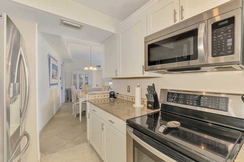 Your fully equipped kitchen features stainless steel appliances, granite counters, and everything you need to create memorable meals during your stay.