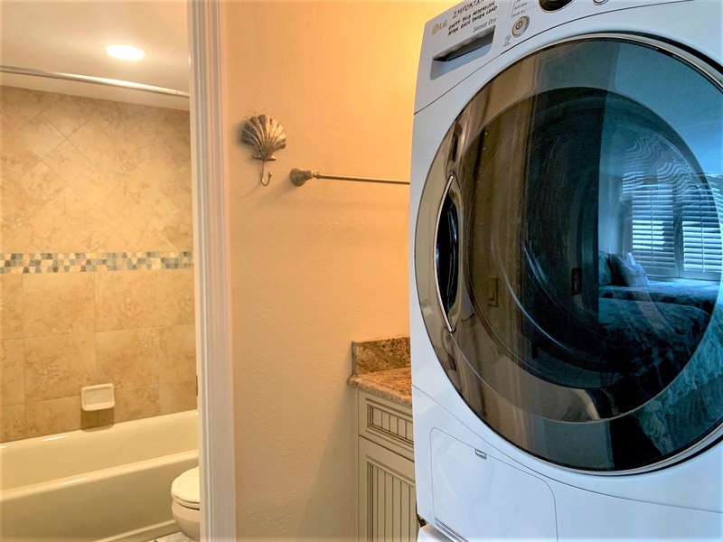 Keep your clothes fresh during your stay with convenient in-unit laundry facilities, right next to your private bathroom.