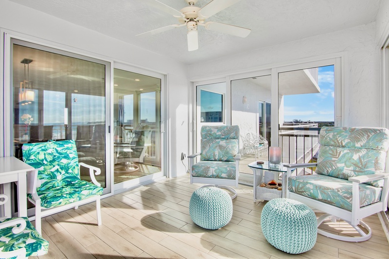 Relax in your tropical oasis with ocean-inspired seating and panoramic views stretching beyond.