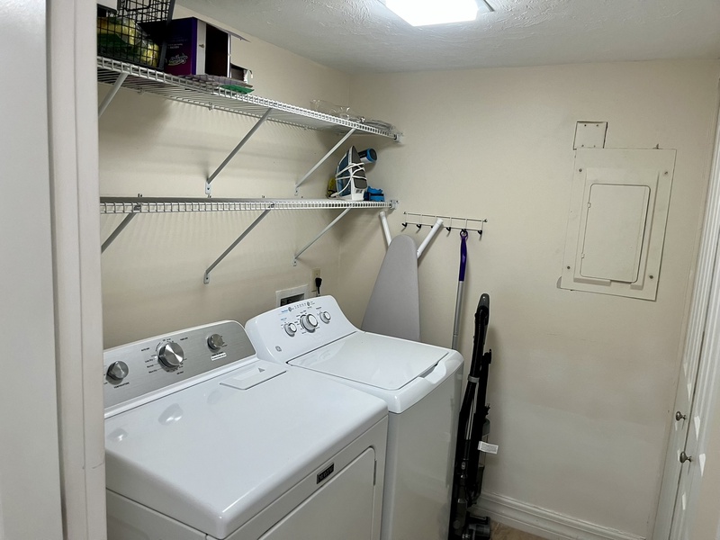 Your private laundry room keeps your stay hassle-free with full-size washer and dryer plus storage shelves for all your needs.