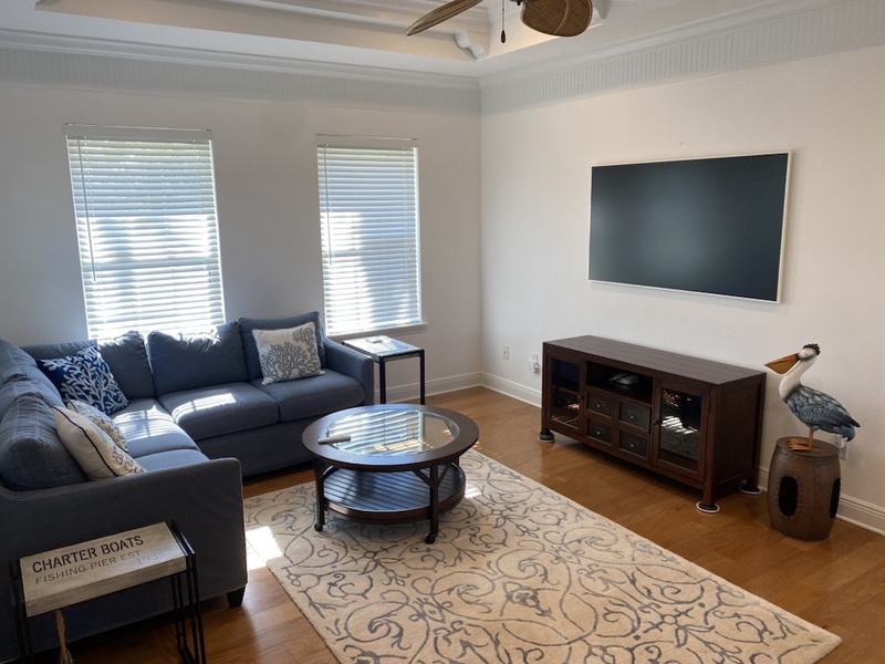 additional living area with 65 in TV