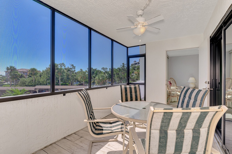 Your screened-in balcony offers breezy dining with tropical views. Sip morning coffee while watching palms sway.