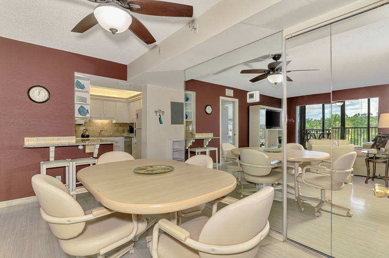 Step into your spacious open-concept retreat, where warm earth tones and vaulted ceilings create an inviting atmosphere for memorable gatherings.