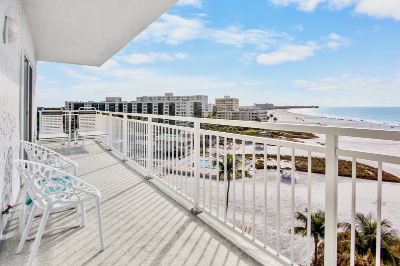 Relax on your private balcony with stunning ocean views, watching waves meet pristine white sand while you sip morning coffee.