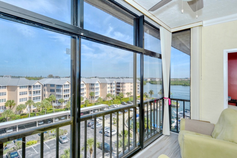 Relax in your bright living space with stunning river views through floor-to-ceiling windows, perfect for morning coffee or evening unwinding.
