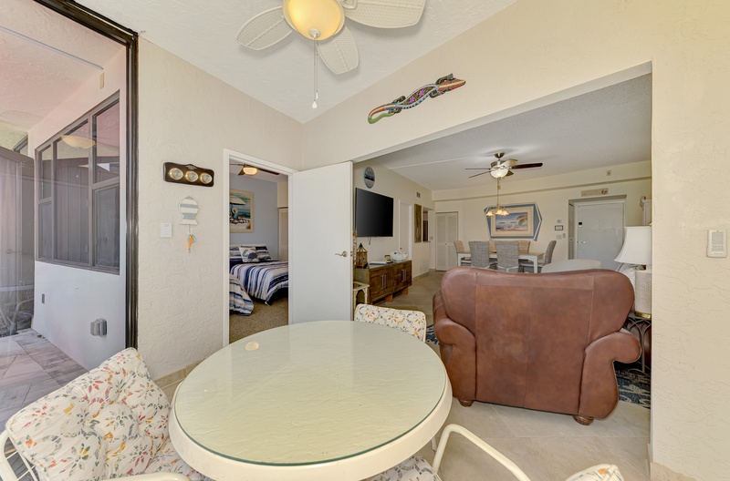 Your spacious retreat flows seamlessly from cozy seating to relaxing bedroom, with coastal touches throughout.
