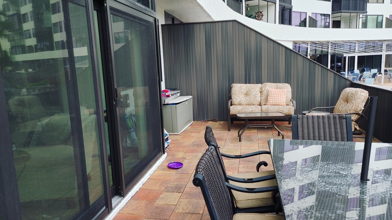 Your private terrace offers comfortable seating and outdoor dining space, perfect for morning coffee or evening relaxation with city views.