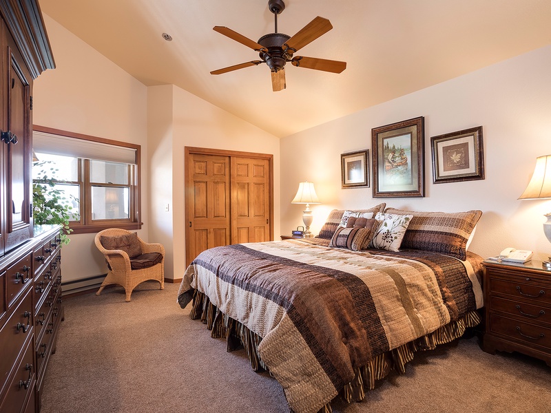 Sink into plush bedding and unwind in your peaceful retreat, where warm wood tones and soft lighting create the perfect ambiance for restful nights.