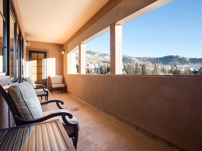 Settle into your private balcony and soak in stunning mountain vistas. Crisp alpine air, cozy seating, and serene winter views create the perfect spot for morning coffee or evening relaxation.