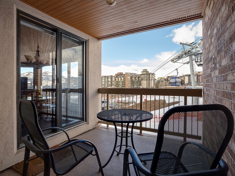 Unwind on your private balcony with breathtaking ski resort and mountain views. Sip morning coffee or evening wine at your bistro table while watching the gondola glide by overhead.
