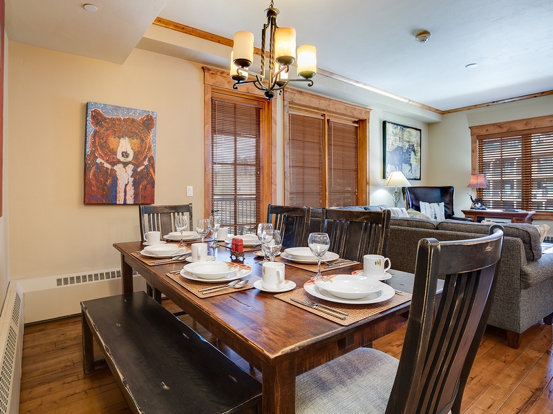 Gather around this spacious dining table with seating for eight, where meals become moments and your group can reconnect over coffee or wine in the warm, mountain-modern atmosphere.