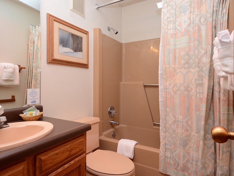 Step into your private bathroom, complete with a full tub-shower combo, fresh towels, and all the essentials you need to feel at home.