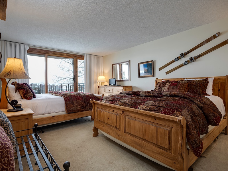 Unwind in your cozy alpine retreat with rustic charm, plush bedding, and ski décor—your perfect home base after mountain adventures.