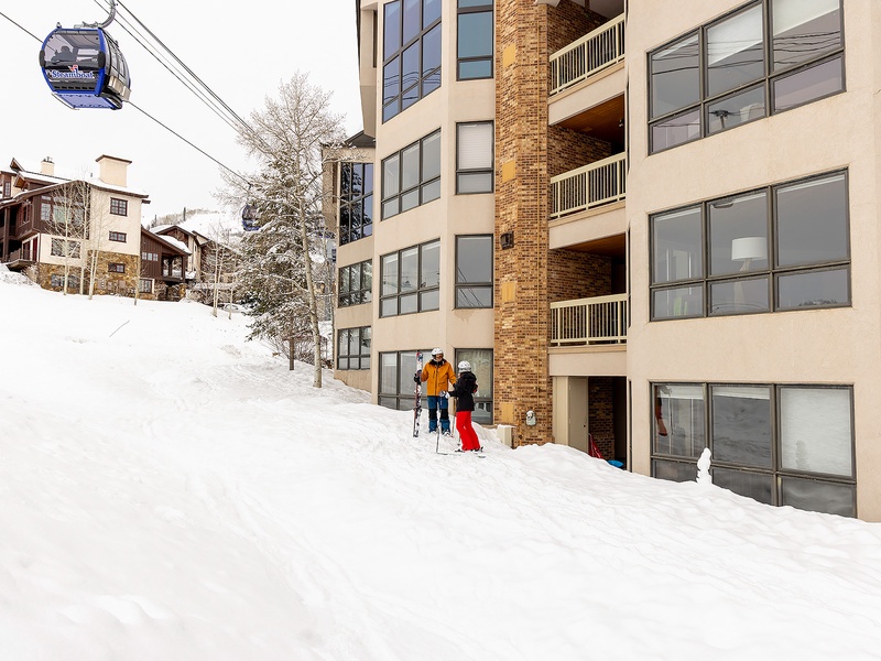 This ski-in/ski-out property sits at the base of the slopes with direct gondola access, offering a prime mountain village location for winter sports enthusiasts.