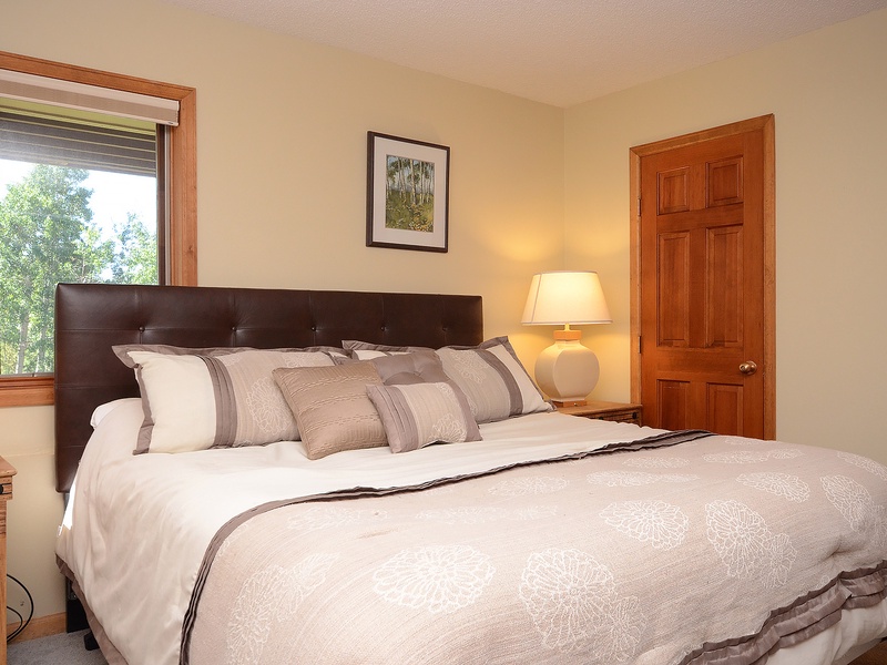 Sink into crisp linens and soft pillows in your private retreat, where natural light and peaceful garden views create the perfect sanctuary for restful nights.
