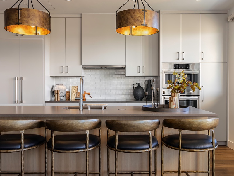 Gather at your private island for casual meals or morning coffee. Sleek countertops, modern appliances, and designer lighting create a space where cooking feels effortless and stylish.