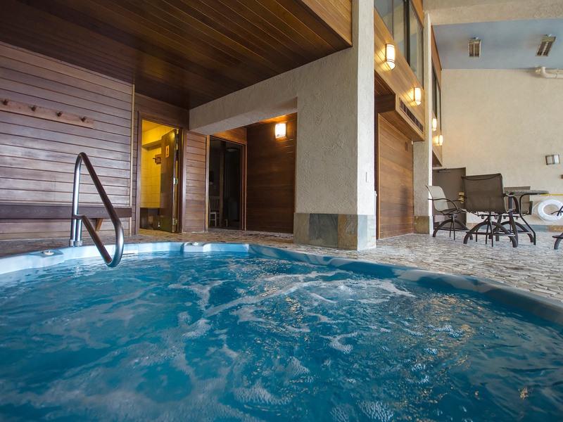 Slip into your private hot tub and let the warm, bubbling water melt away your cares under rich wood ceilings and soft ambient lighting.