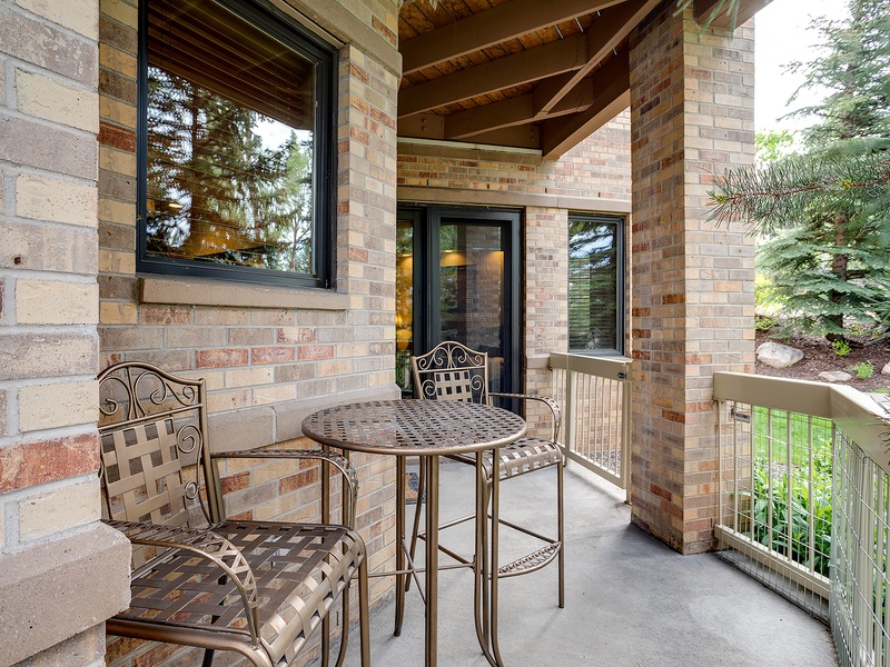 Enjoy your morning coffee on this private balcony, where lush greenery and peaceful surroundings create the perfect spot to relax and breathe in the fresh air.