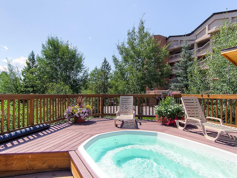 Soak away the day in your private hot tub on the deck, surrounded by mountain greenery and fresh alpine air under a big blue sky.
