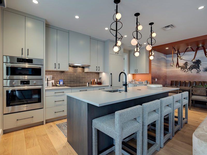 Your gourmet kitchen blends contemporary style with full-size appliances and a spacious island where you can gather for meals or unwind with a glass of wine.