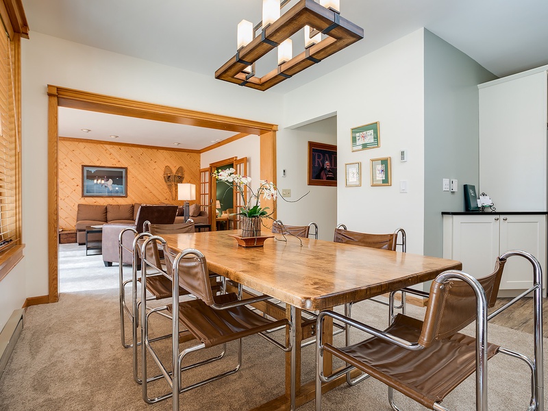 Gather around this stunning live-edge dining table, where warm wood tones and modern design create your perfect spot for memorable meals and conversations with loved ones.