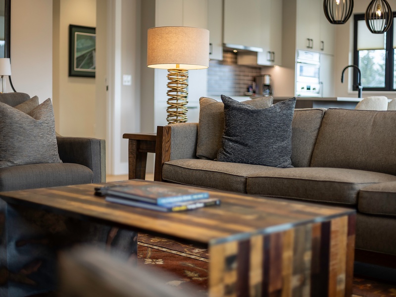 Sink into plush sofas and lose yourself in a good book in this inviting living area, where natural light and thoughtful design create the perfect spot to unwind after a day of exploring.