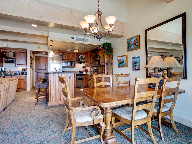 Gather around the elegant dining table where your group can share meals and stories, with a fully equipped kitchen ready for all your home-cooked favorites.