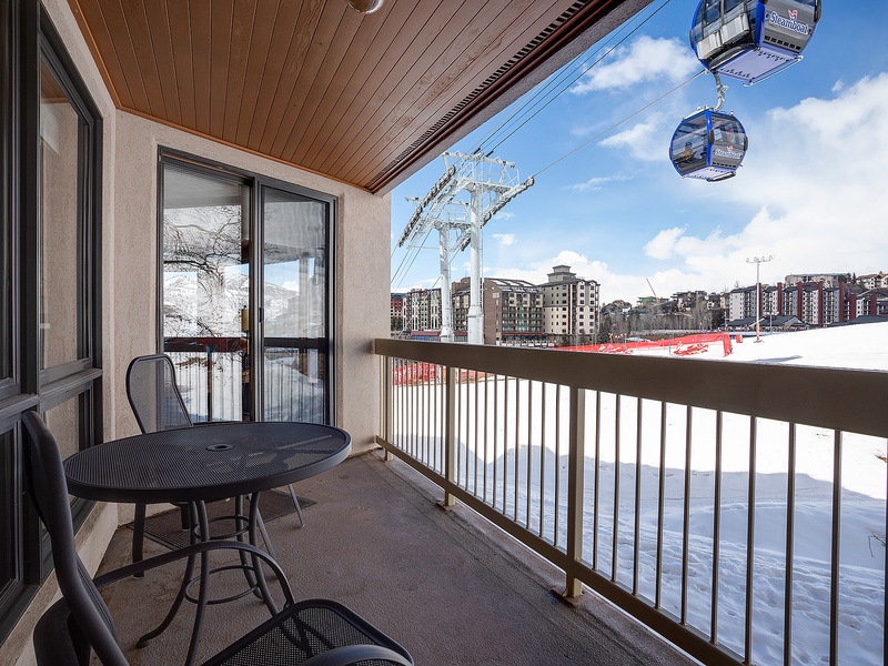 Private balcony overlooks the ski slopes and gondola, offering a front-row seat to the mountain action with scenic resort views and fresh alpine air.