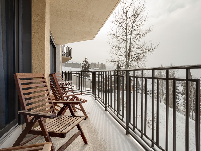 A private balcony with snowy mountain views offers the perfect spot to sip your morning coffee while taking in the winter landscape and crisp alpine air.
