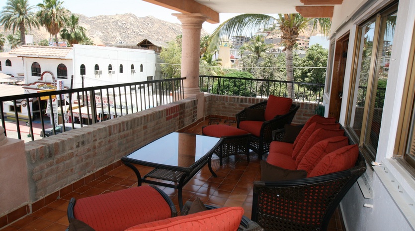 Watch the nightlife from a private patio