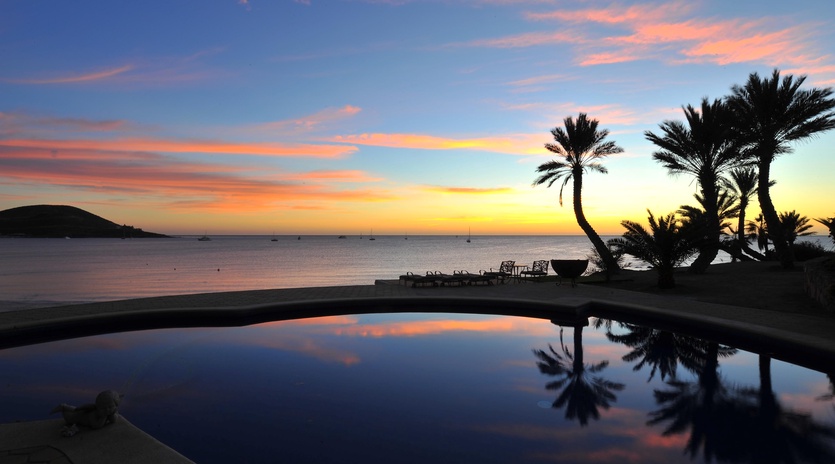 Pool with beautiful ocean view at sunset