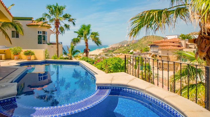 Patio with lounge chairs and pool