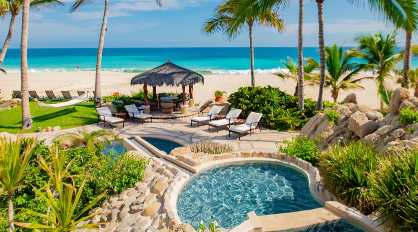 Gorgeous patio with pool and beachfront