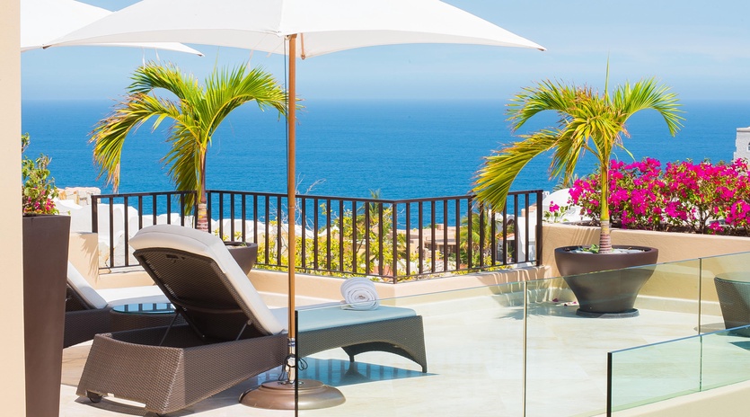 Sunny patio with lounge chairs