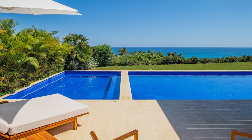 Poolside with jacuzzi and ocean views