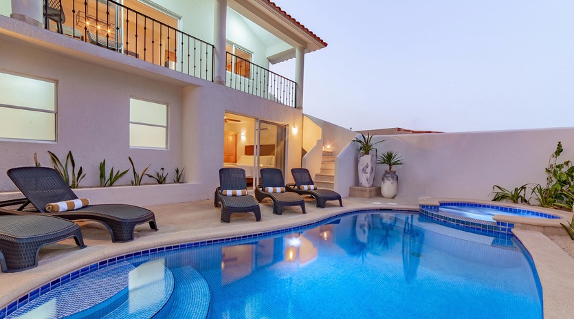 Inviting outdoor terrace with swimming pool, jacuzzi and patio furniture