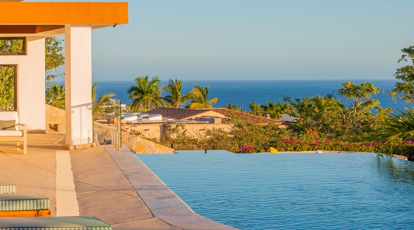 Poolside patio with ocean view