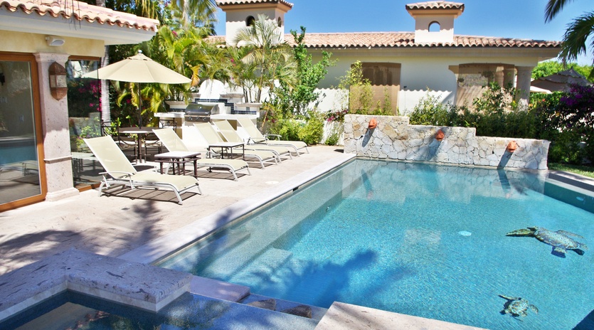 Sunny poolside and jacuzzi