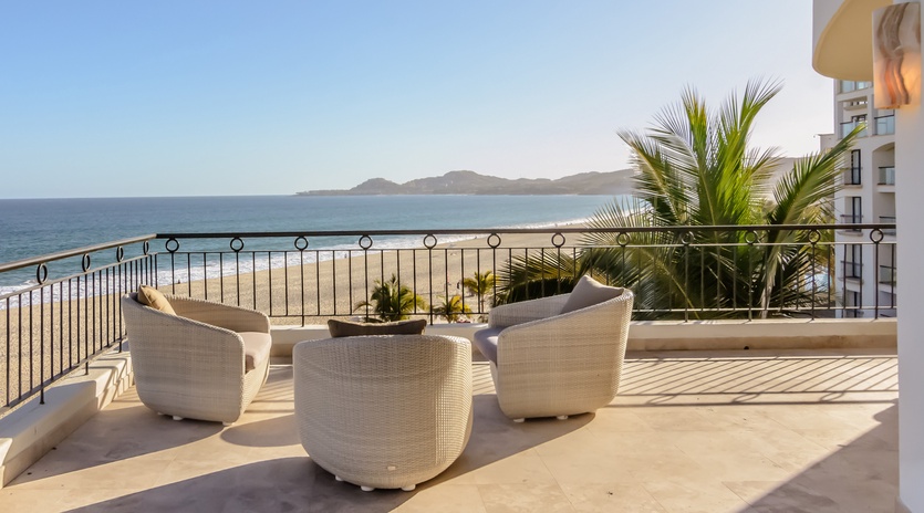 Patio with beachfront and ocean views