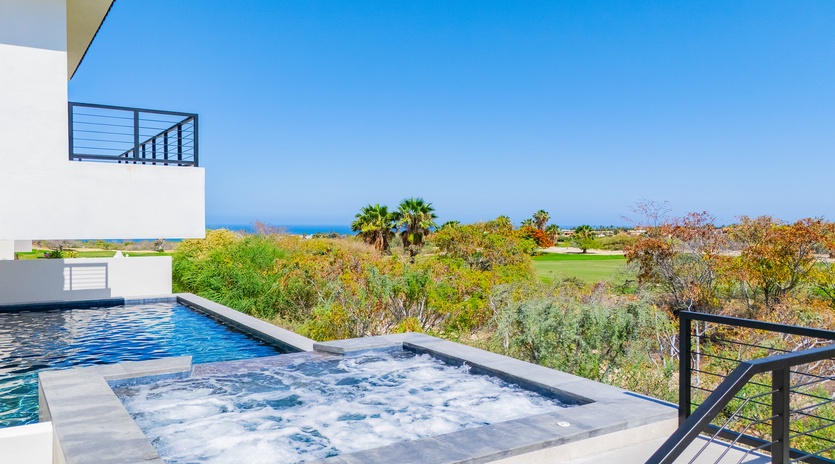 Jacuzzi and pool with ocean views