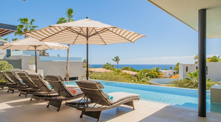Soak up the tropical paradise from your private infinity pool terrace, where ocean views and swaying palms create the perfect retreat.