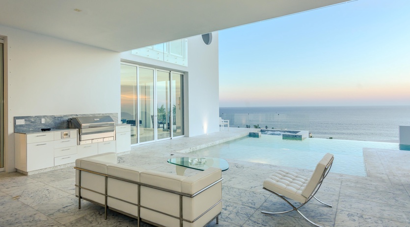 Relax in your private infinity pool with stunning ocean views stretching endlessly before you. Modern luxury meets serene comfort.