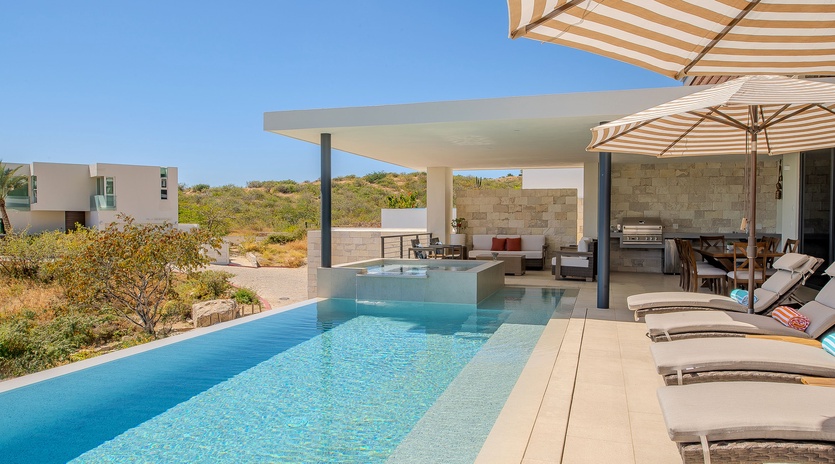 Dive into crystal-clear waters while lounging on your private terrace, where modern comfort meets stunning natural landscape views.