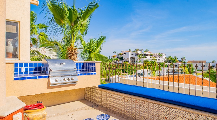 Sunny patio with BBQ grill