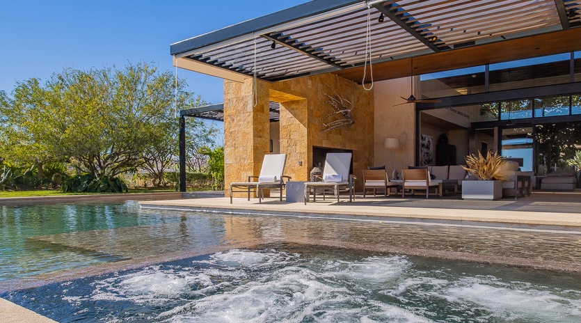Poolside with view of villa