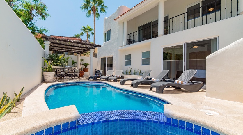 Inviting outdoor terrace with swimming pool, jacuzzi and patio furniture