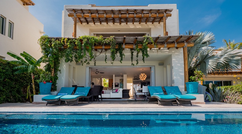 Poolside view of beautiful exterior